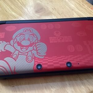 Nintendo 3DS XL in Vibrant Red with Mario Motif